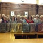 Preston Soroptimists with their bags of items for the Salvation Army for local homeless