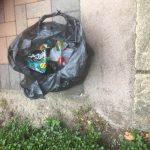 Marissa picking up litter