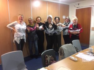 Members modelling the bras they collected to send to Smalls for All.