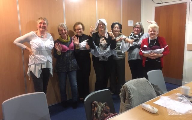 Members modelling the bras they collected to send to Smalls for All.