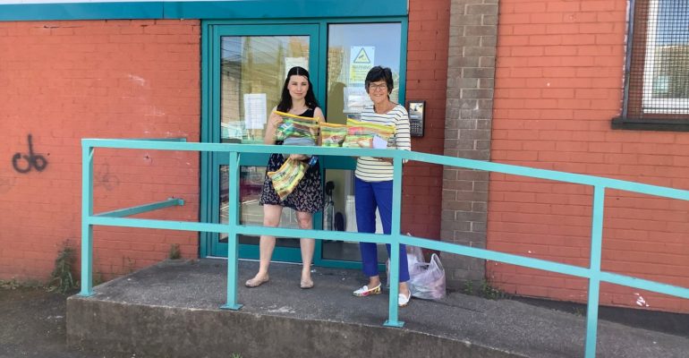 Member Lynn Yates delivering toiletry bags to the Foxton Centre