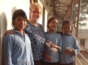 President Margaret with girls in Nepal