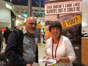Modern day slavery info stand - Margaret Molyneux and enquirer