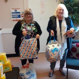 Soroptimists with bags of essential items for local womens aid charity