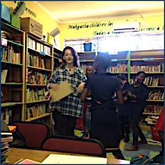 Mia helping the students in the library