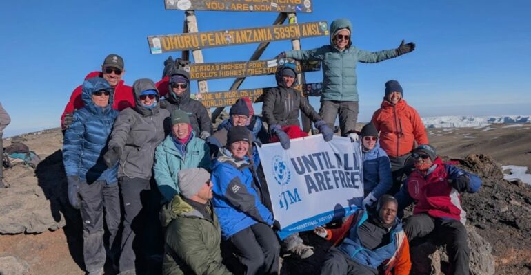 Katelyn Lenander on the summit of Kilimanjaro