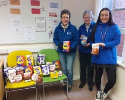 Club Members delivered Easter Eggs and chocolates at Nelson Trust