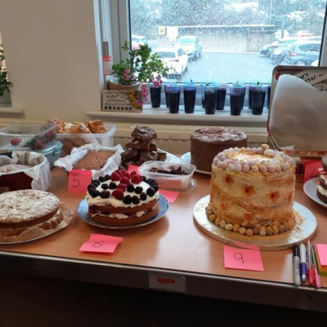 A table of cakes, ready for the judges