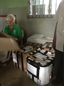 Elizabeth with the parcels we had sent out to coincide with our arrival containing baby clothes etc