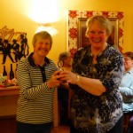 The winners' trophy, presented to Di Hill by Barnstaple president, Christine Watts