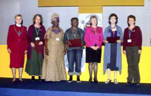 Melanie and Ruth are on the left receiving the award